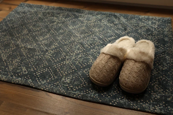 Slippers on a rug
