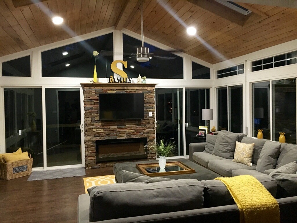 Sunroom living area at nighttime 