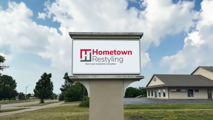 Hometown Restyling sign outside their office in Hiawatha, Iowa