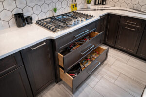 Kitchen Remodel Upgrade Ideas: Deep storage shelves under the stove for pots and pans