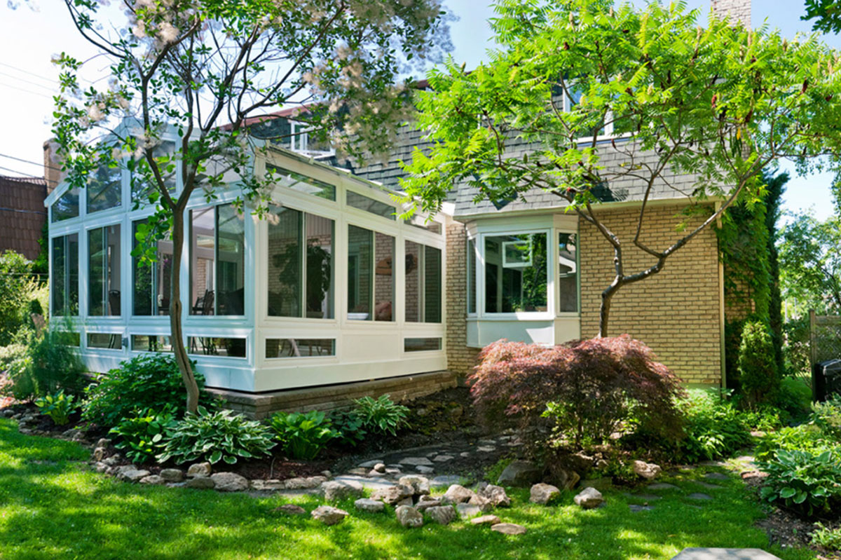 sunroom on the back of a house - backyard