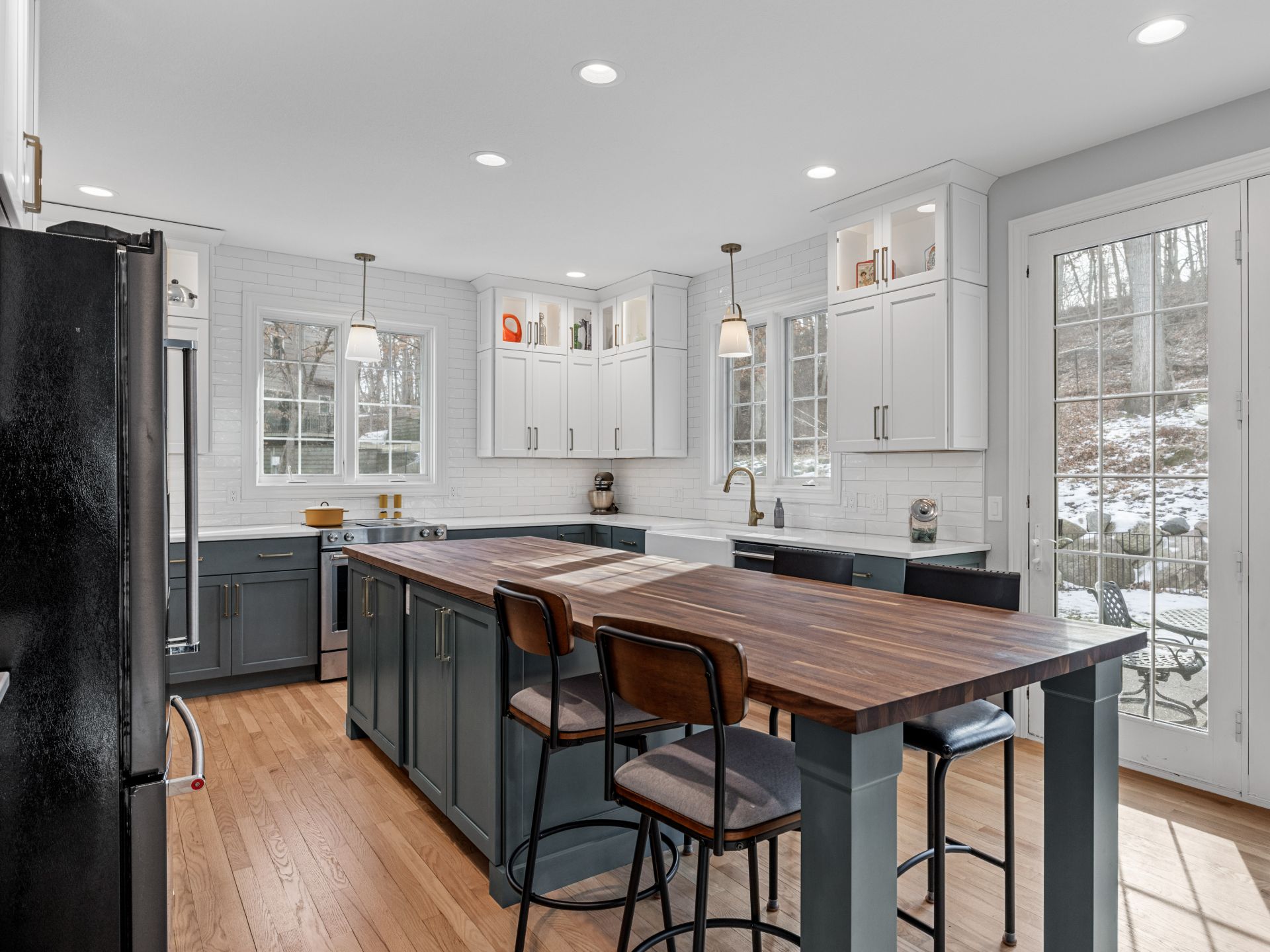 custom kitchen design with kitchen island at the center for holiday hosting and every day use. hometown restyling