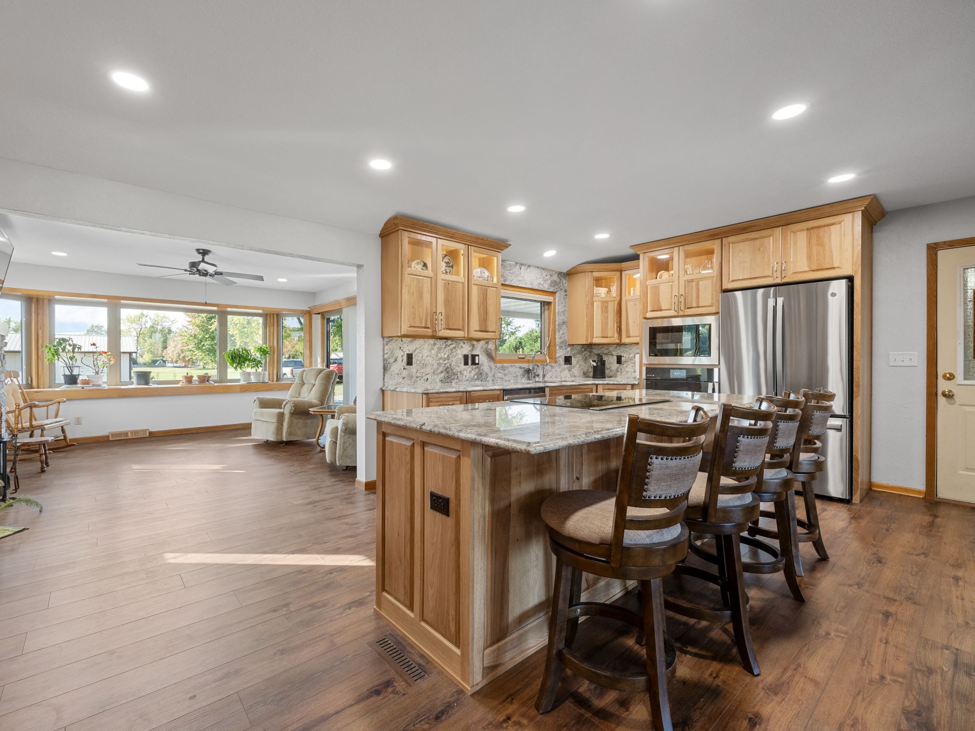 open floorplan kitchen design, ready for holiday hosting with an island and cabinets. hometown restyling