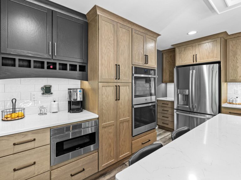 Remodeled kitchen with new kitchen cabinets by Hometown Restyling