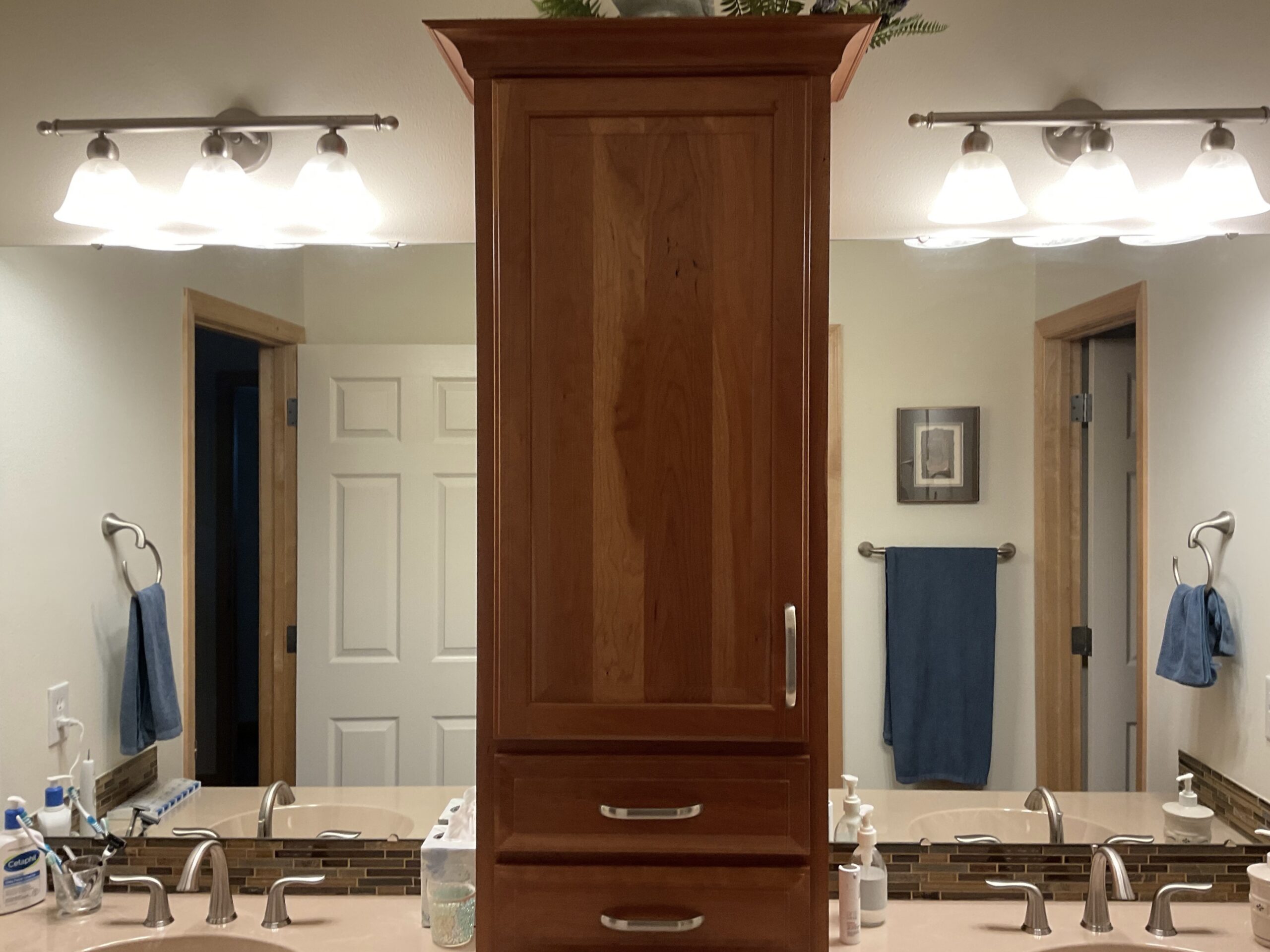 10 Small Home Remodeling Projects That Are Perfect for Eastern Iowa Winters 2 light fixture handyman update